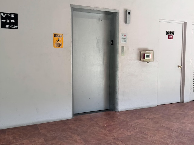 interior space with elevator