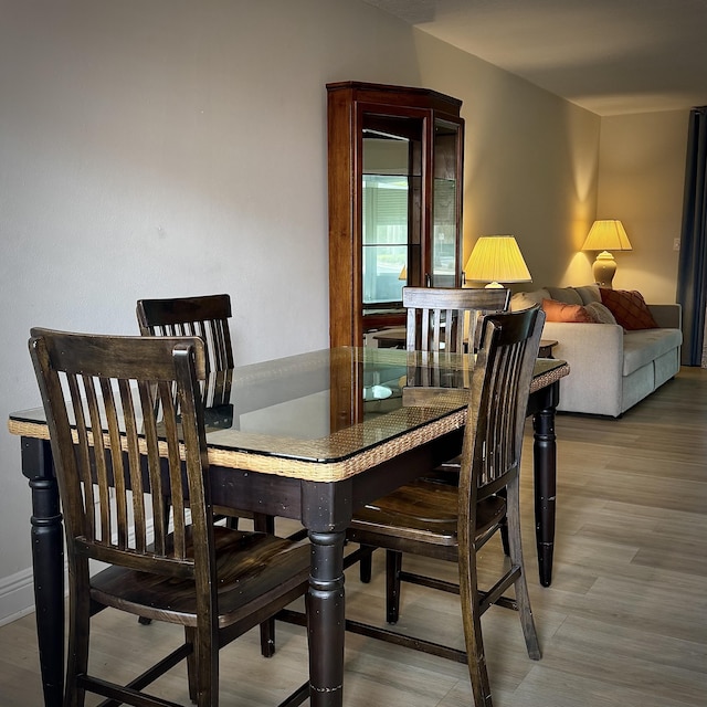 dining area featuring wood finished floors