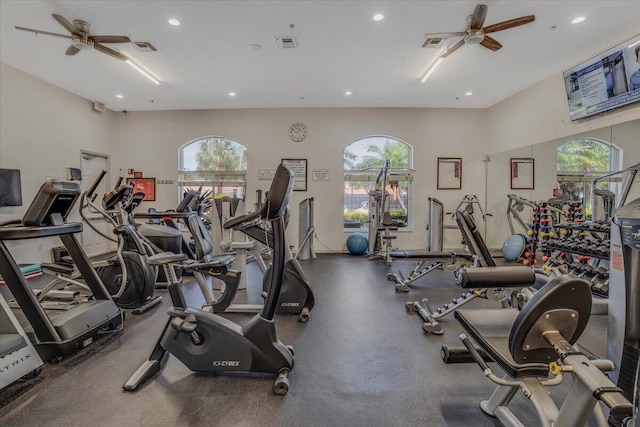 workout area featuring a wealth of natural light, recessed lighting, visible vents, and ceiling fan