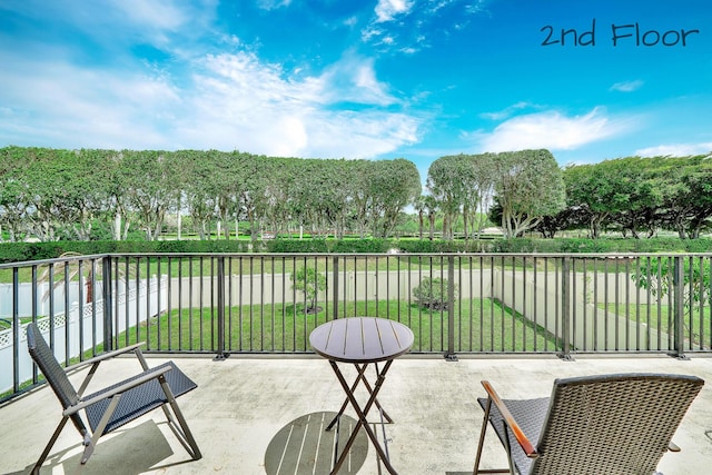 view of patio / terrace with a water view