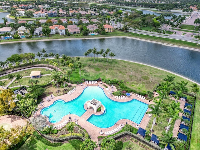 birds eye view of property featuring a water view