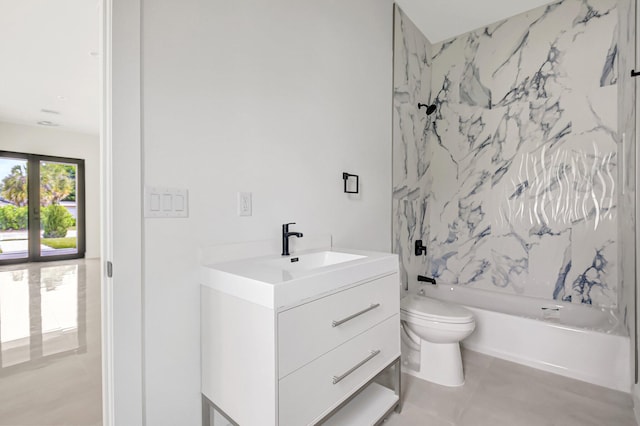 bathroom featuring toilet, tile patterned floors, vanity, and tub / shower combination