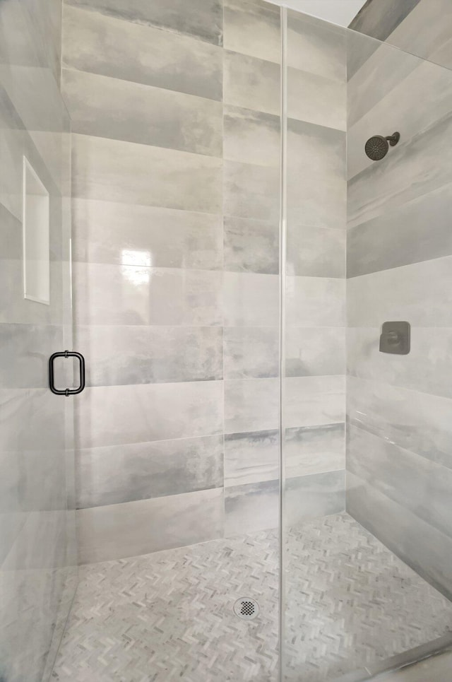 bathroom with a stall shower