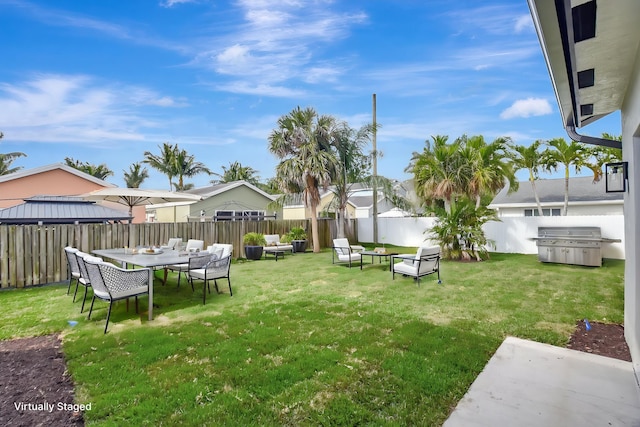 view of yard featuring a fenced backyard