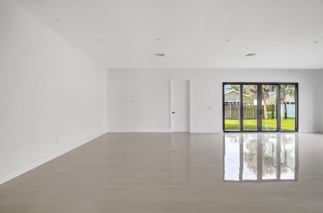 empty room with baseboards
