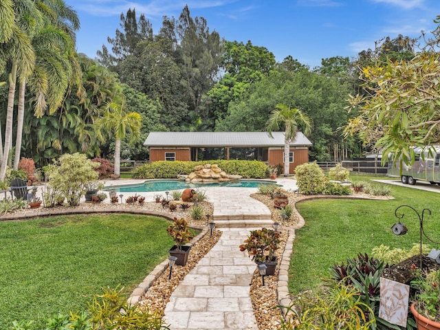 5020 SW 188th Ave, Southwest Ranches, FL 33332 - view of yard with an outdoor pool and a patio area