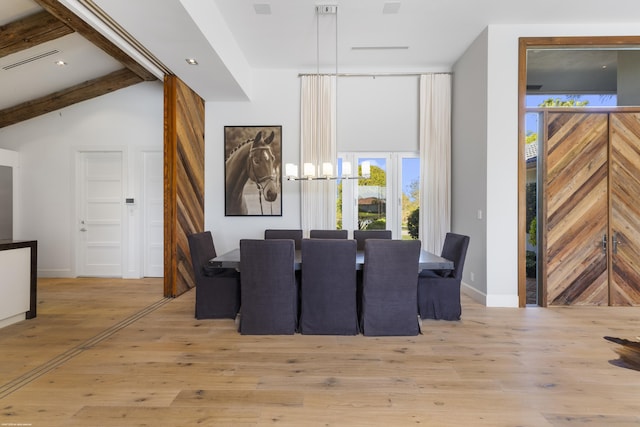 dining area with visible vents, vaulted ceiling with beams, baseboards, and hardwood / wood-style flooring