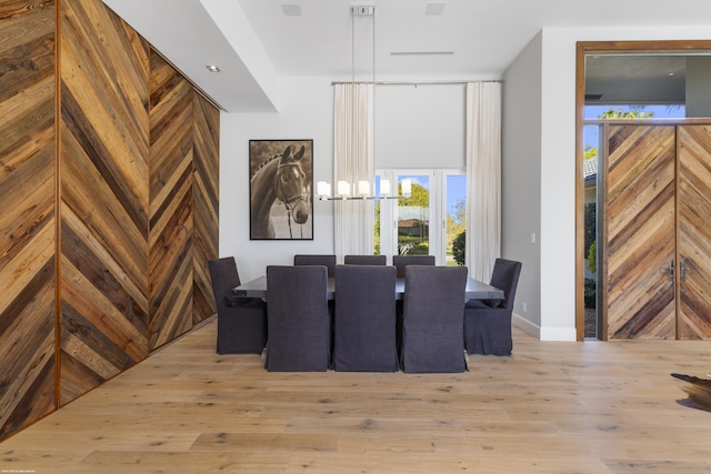 dining area featuring wood finished floors and baseboards