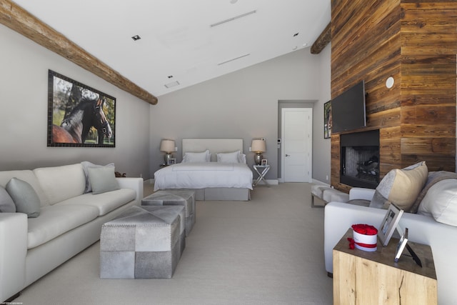 bedroom with high vaulted ceiling, wooden walls, carpet floors, a large fireplace, and baseboards