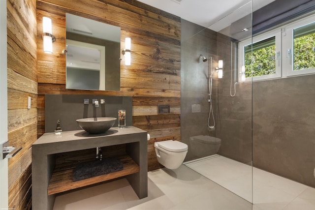 full bath featuring walk in shower, wood walls, and toilet
