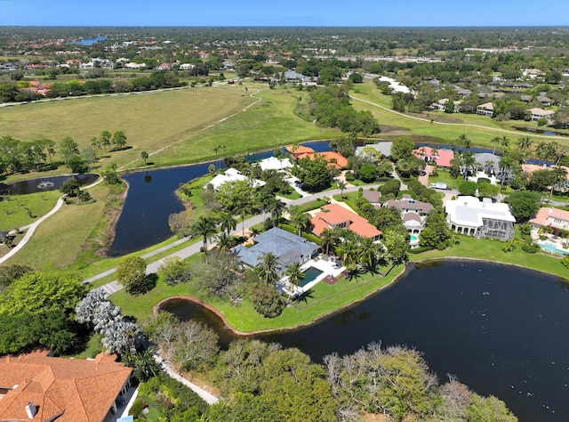 aerial view featuring a residential view and a water view