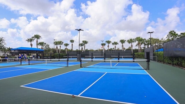view of sport court with fence and community basketball court