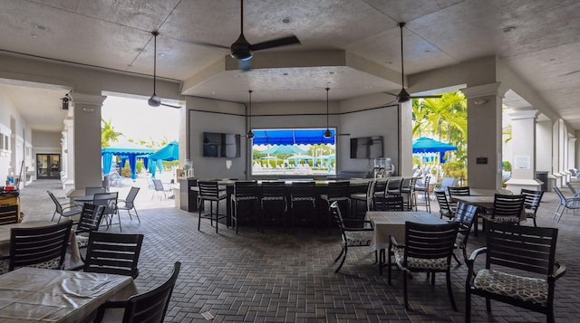 view of patio / terrace featuring outdoor dining space and ceiling fan