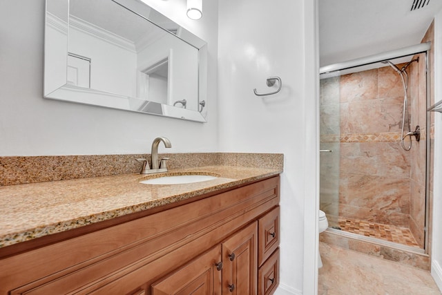 full bathroom featuring visible vents, crown molding, a shower stall, vanity, and toilet