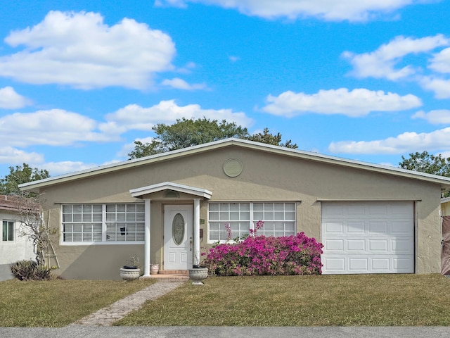 ranch-style house featuring a front yard, a garage, and stucco siding