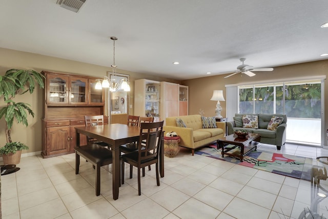 6170 Sugar Loaf Ln, West Palm Beach, FL 33411 - dining area with light tile patterned floors, visible vents, recessed lighting, and ceiling fan with notable chandelier