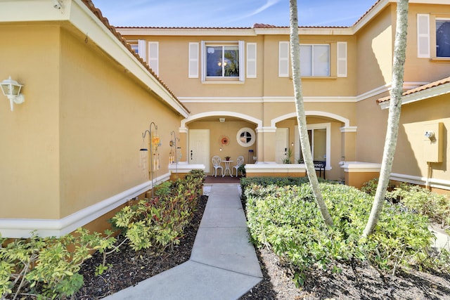 6170 Sugar Loaf Ln, West Palm Beach, FL 33411 - view of exterior entry featuring stucco siding