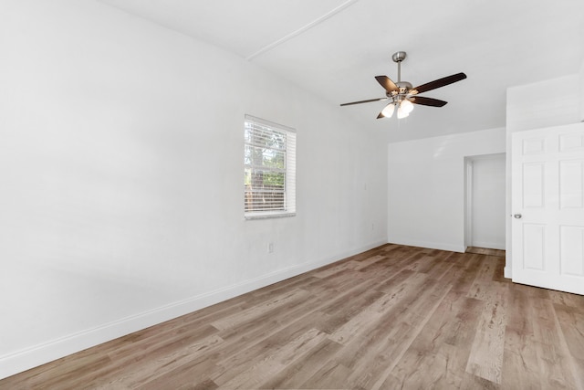 1134 NW 18th Ave, Fort Lauderdale, FL 33311 - empty room featuring baseboards, a ceiling fan, and light wood-type flooring