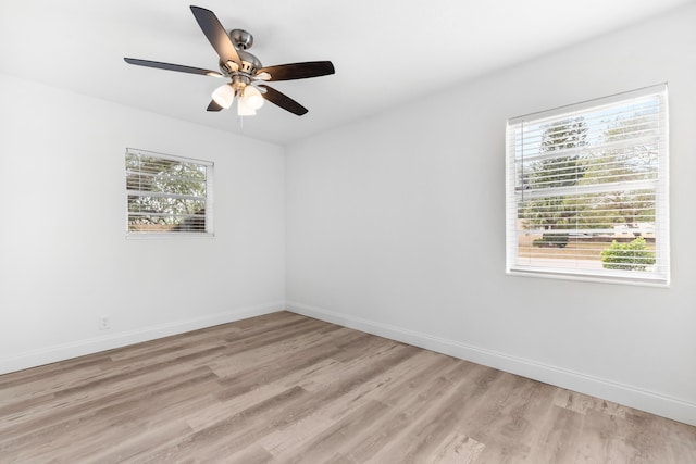 1134 NW 18th Ave, Fort Lauderdale, FL 33311 - unfurnished room with baseboards, light wood-style floors, and a ceiling fan