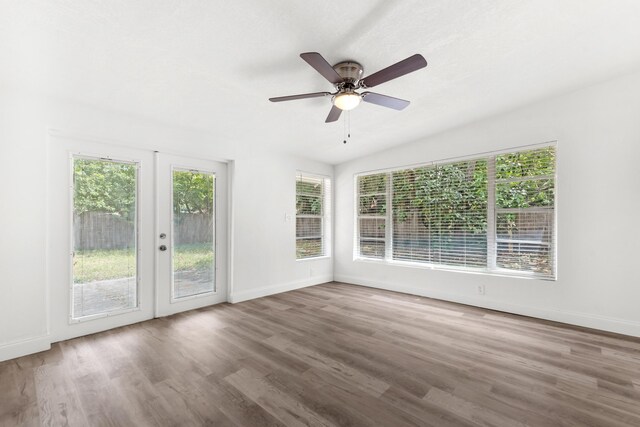 1134 NW 18th Ave, Fort Lauderdale, FL 33311 - unfurnished sunroom featuring french doors