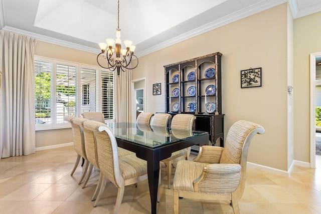 dining room featuring a chandelier, light tile patterned flooring, and ornamental molding