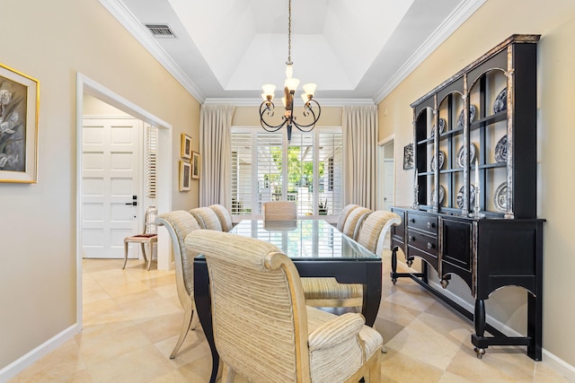 dining area with baseboards, crown molding, a chandelier, and visible vents