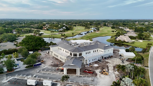 aerial view featuring a water view and golf course view