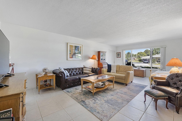 232 High Point Ct W Unit C, Delray Beach, FL 33445 - living area with light tile patterned floors and a textured ceiling