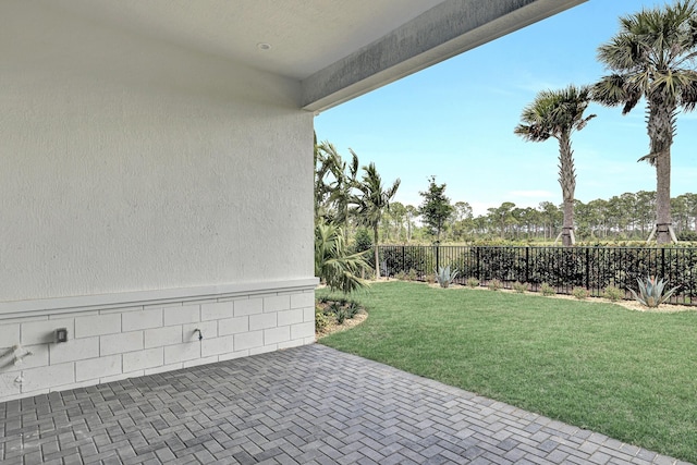 view of yard with a fenced backyard and a patio area