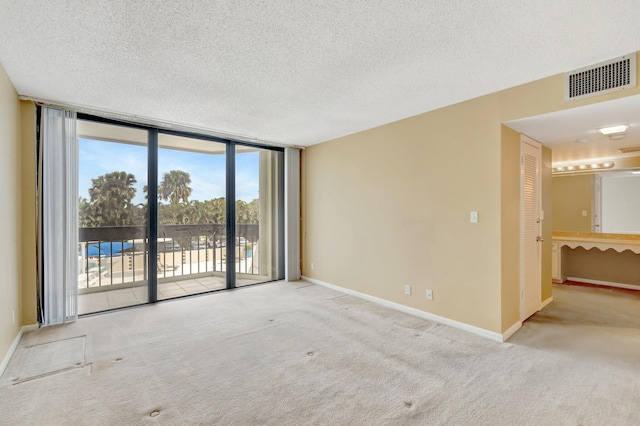 2000 Presidential Way Unit 204, West Palm Beach, FL 33401 - clothes washing area featuring a ceiling fan, light tile patterned floors, washer / dryer, and visible vents
