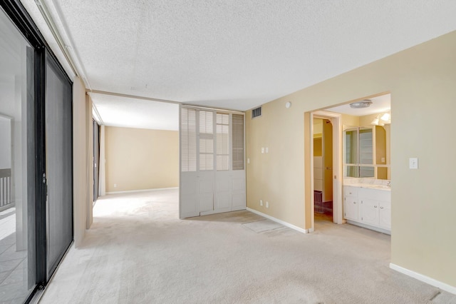 2000 Presidential Way Unit 204, West Palm Beach, FL 33401 - walk in closet with light colored carpet