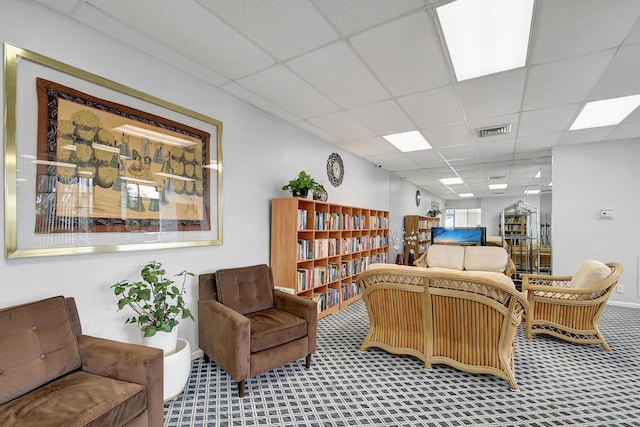 2000 Presidential Way Unit 204, West Palm Beach, FL 33401 - carpeted living area with a drop ceiling and visible vents