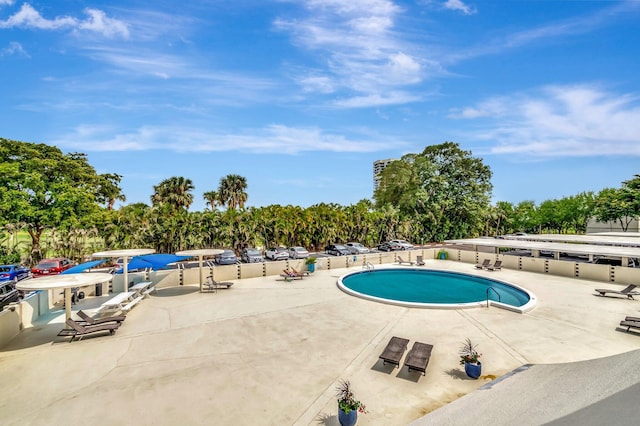 2000 Presidential Way Unit 204, West Palm Beach, FL 33401 - community pool featuring a patio area