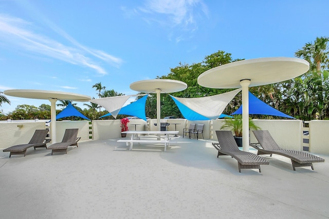 2000 Presidential Way Unit 204, West Palm Beach, FL 33401 - view of patio with outdoor dining space
