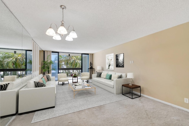 2000 Presidential Way Unit 204, West Palm Beach, FL 33401 - interior space with expansive windows, a textured ceiling, baseboards, carpet, and an inviting chandelier