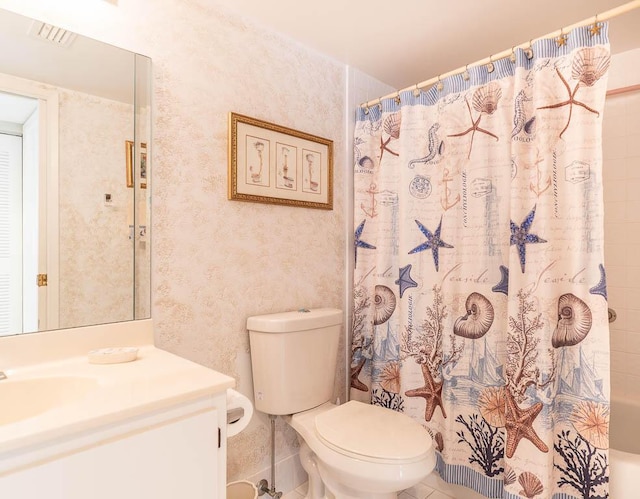 bathroom featuring wallpapered walls, visible vents, toilet, and vanity