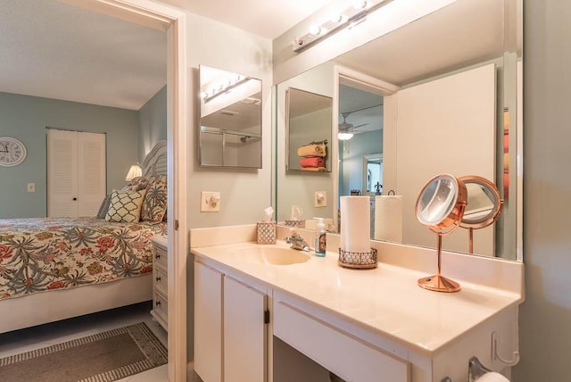 bathroom featuring vanity and a ceiling fan