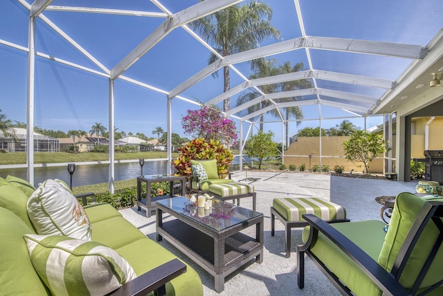 2036 SW Mayflower Dr, Palm City, FL 34990 - view of patio with outdoor lounge area, a water view, and a lanai