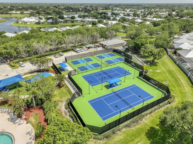 2036 SW Mayflower Dr, Palm City, FL 34990 - aerial view of residential area with a nearby body of water and a pool area