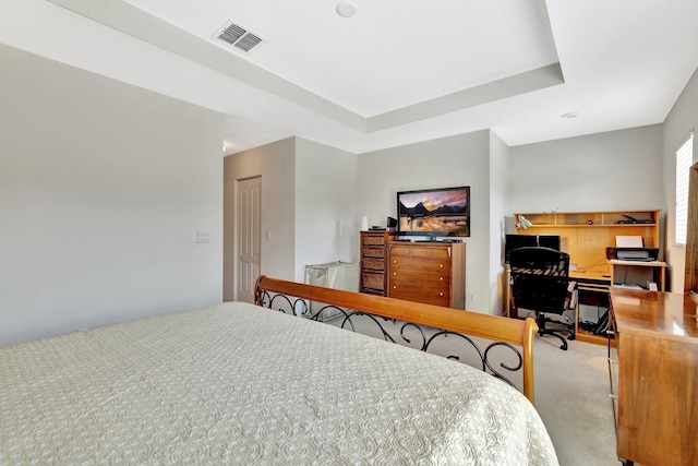 2061 SE Glen Ridge Dr, Port Saint Lucie, FL 34952 - carpeted bedroom with a tray ceiling and visible vents