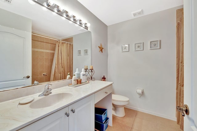 2061 SE Glen Ridge Dr, Port Saint Lucie, FL 34952 - bathroom featuring tile patterned floors, toilet, baseboards, visible vents, and vanity