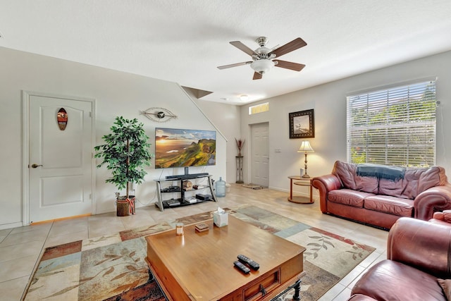 2061 SE Glen Ridge Dr, Port Saint Lucie, FL 34952 - living area with a ceiling fan, visible vents, and light tile patterned floors