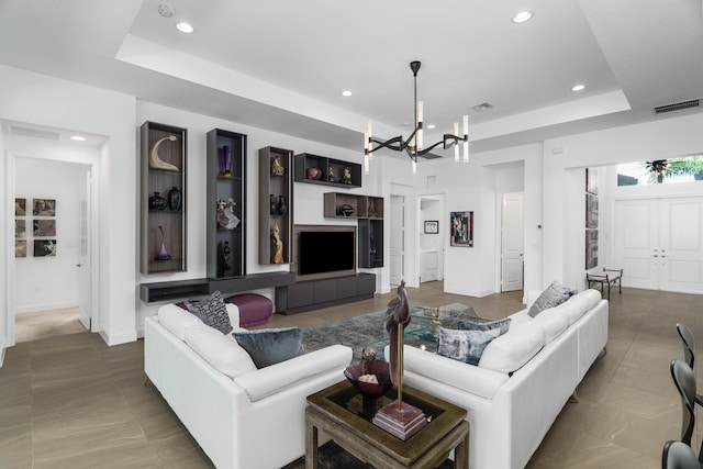 9237 Seahorse Bay Dr, Boynton Beach, FL 33473 - tiled living area with an inviting chandelier, a raised ceiling, recessed lighting, and visible vents