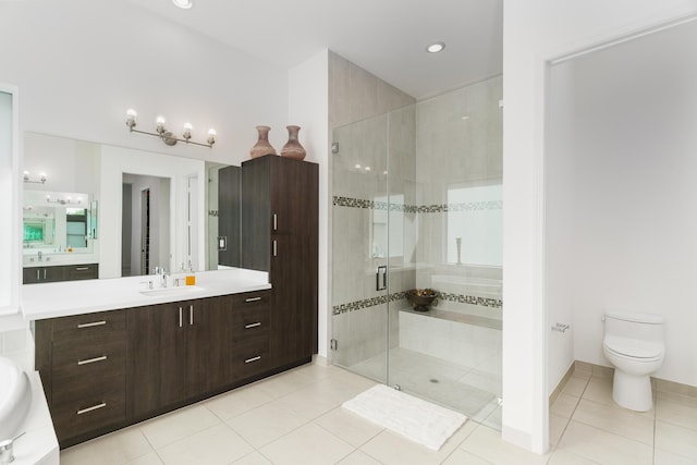 9237 Seahorse Bay Dr, Boynton Beach, FL 33473 - full bath featuring vanity, recessed lighting, toilet, tile patterned floors, and a stall shower