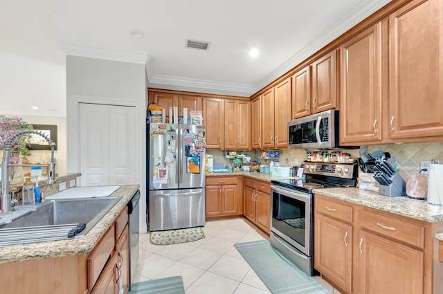 5541 Wishing Star Ln, Greenacres, FL 33463 - kitchen with light tile patterned flooring, backsplash, a sink, stainless steel appliances, and visible vents