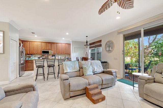 5541 Wishing Star Ln, Greenacres, FL 33463 - living area with baseboards, recessed lighting, ornamental molding, and light tile patterned floors