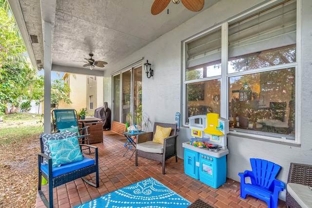 5541 Wishing Star Ln, Greenacres, FL 33463 - view of patio with grilling area and a ceiling fan