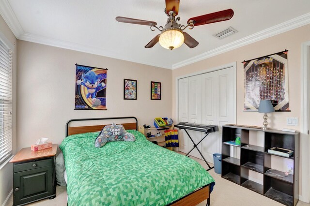 5541 Wishing Star Ln, Greenacres, FL 33463 - bedroom featuring crown molding, a closet, a ceiling fan, light colored carpet, and visible vents