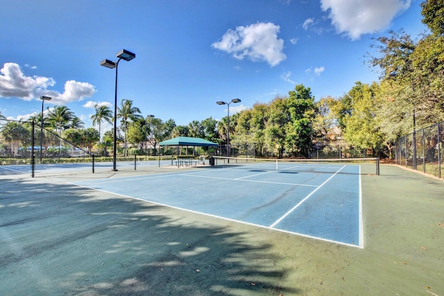 5541 Wishing Star Ln, Greenacres, FL 33463 - view of tennis court featuring fence