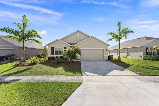9213 Potomac Dr, Fort Pierce, FL 34945 - view of front of property featuring a front yard, driveway, stucco siding, and an attached garage